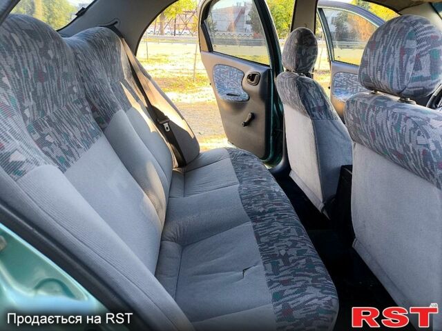 Зеленый Дэу Ланос, объемом двигателя 1.5 л и пробегом 280 тыс. км за 2200 $, фото 7 на Automoto.ua