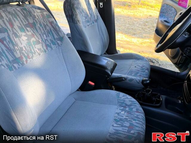 Зеленый Дэу Ланос, объемом двигателя 1.5 л и пробегом 280 тыс. км за 2200 $, фото 8 на Automoto.ua