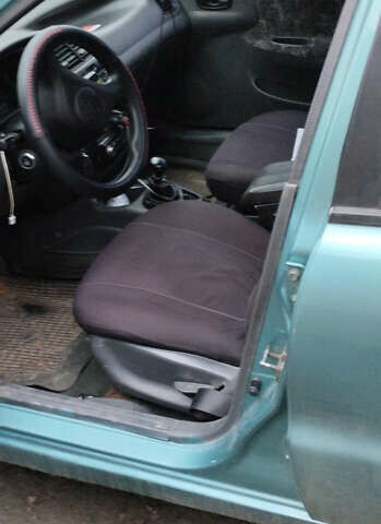 Зеленый Дэу Ланос, объемом двигателя 1.5 л и пробегом 205 тыс. км за 2500 $, фото 4 на Automoto.ua