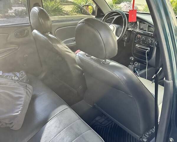 Дэу Ланос 1998 в Одессе на Automoto.ua Зеленый Дэу Ланос, объемом двигателя 1.5 л и пробегом 190 тыс. км за 1550 $, фото 2 на Automoto.ua