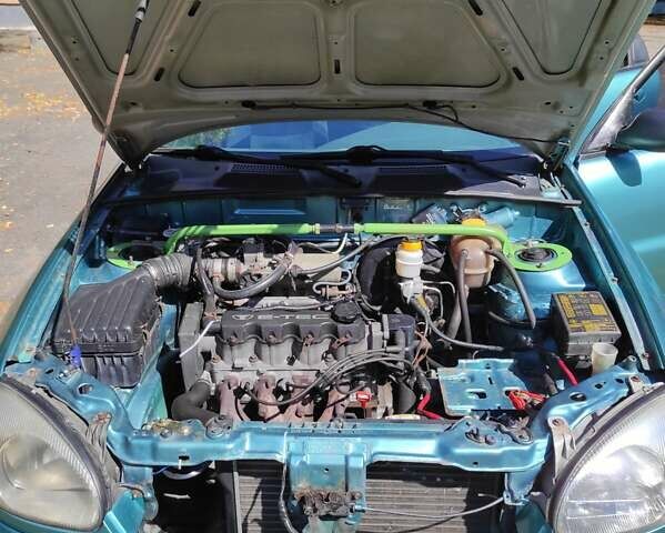 Дэу Ланос 1998 в Черкассах на Automoto.ua Зеленый Дэу Ланос, объемом двигателя 1.5 л и пробегом 548 тыс. км за 1200 $, фото 3 на Automoto.ua