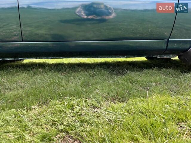 Зеленый Дэу Ланос, объемом двигателя 1.5 л и пробегом 443 тыс. км за 1900 $, фото 34 на Automoto.ua