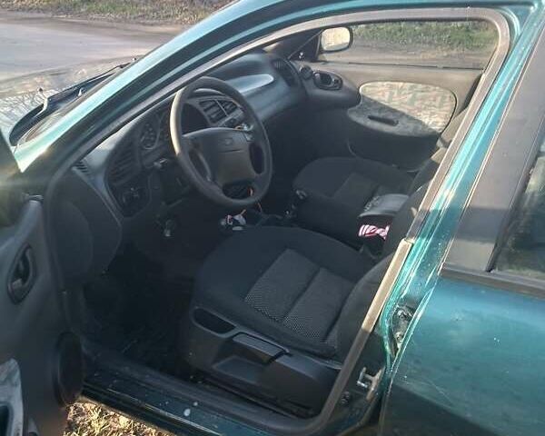 Зеленый Дэу Ланос, объемом двигателя 0 л и пробегом 234 тыс. км за 999 $, фото 1 на Automoto.ua