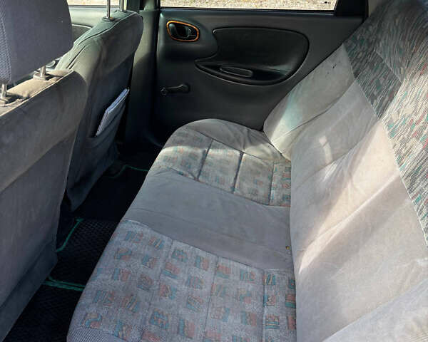 Зелений Деу Ланос, об'ємом двигуна 1.5 л та пробігом 300 тис. км за 1699 $, фото 8 на Automoto.ua