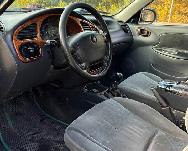 Зелений Деу Ланос, об'ємом двигуна 1.5 л та пробігом 300 тис. км за 1699 $, фото 9 на Automoto.ua