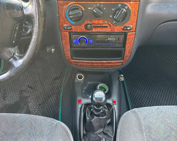 Зелений Деу Ланос, об'ємом двигуна 1.5 л та пробігом 300 тис. км за 1699 $, фото 7 на Automoto.ua