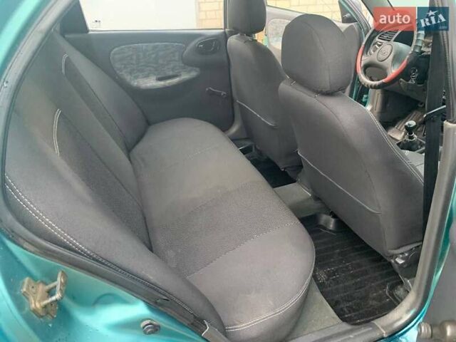 Зелений Деу Ланос, об'ємом двигуна 1.5 л та пробігом 178 тис. км за 1320 $, фото 17 на Automoto.ua
