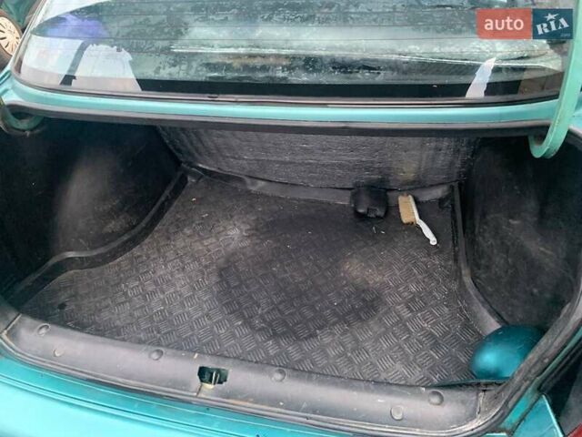 Зелений Деу Ланос, об'ємом двигуна 1.5 л та пробігом 178 тис. км за 1320 $, фото 13 на Automoto.ua