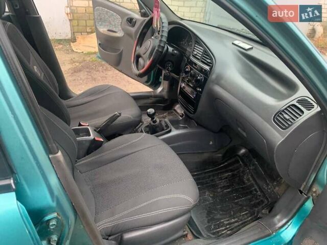 Зелений Деу Ланос, об'ємом двигуна 1.5 л та пробігом 178 тис. км за 1320 $, фото 12 на Automoto.ua