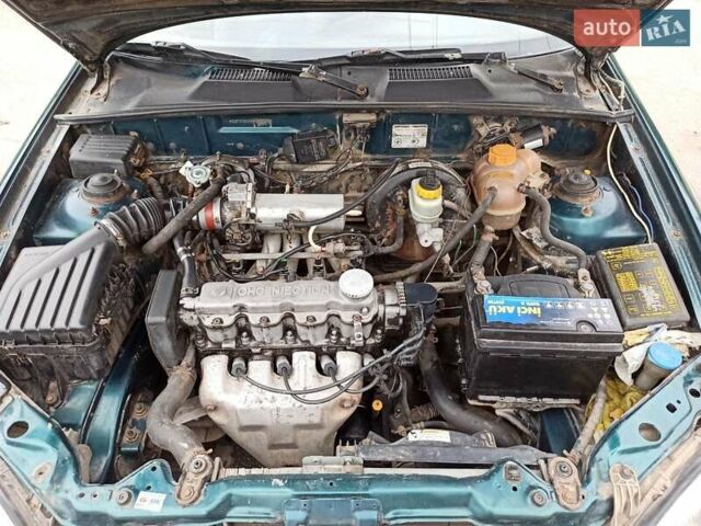 Зеленый Дэу Ланос, объемом двигателя 1.5 л и пробегом 280 тыс. км за 1400 $, фото 5 на Automoto.ua