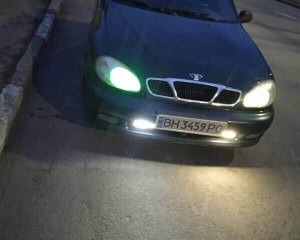 Зеленый Дэу Ланос, объемом двигателя 1.5 л и пробегом 34 тыс. км за 1800 $, фото 4 на Automoto.ua