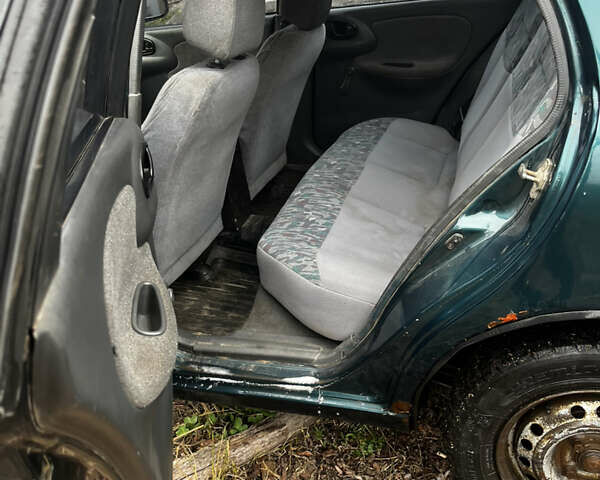 Зеленый Дэу Ланос, объемом двигателя 1.5 л и пробегом 200 тыс. км за 1400 $, фото 24 на Automoto.ua