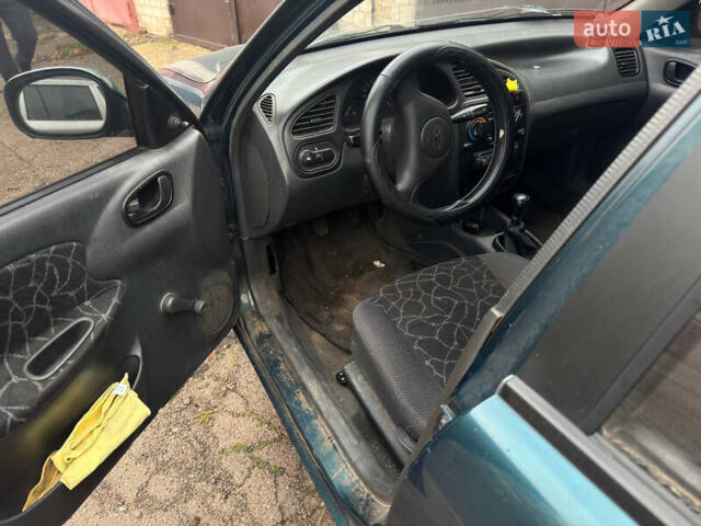 Зеленый Дэу Ланос, объемом двигателя 1.5 л и пробегом 230 тыс. км за 1250 $, фото 2 на Automoto.ua