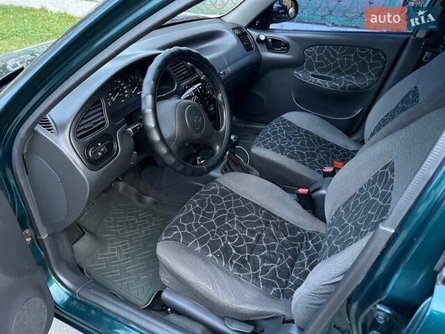 Зеленый Дэу Ланос, объемом двигателя 1.5 л и пробегом 267 тыс. км за 2750 $, фото 3 на Automoto.ua