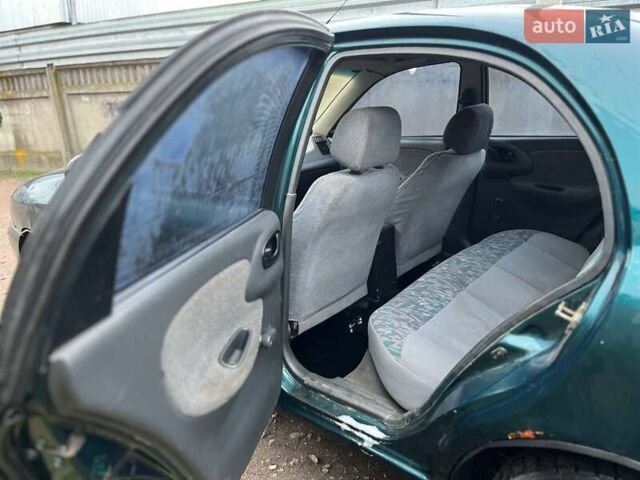 Зелений Деу Ланос, об'ємом двигуна 1.5 л та пробігом 200 тис. км за 1500 $, фото 10 на Automoto.ua
