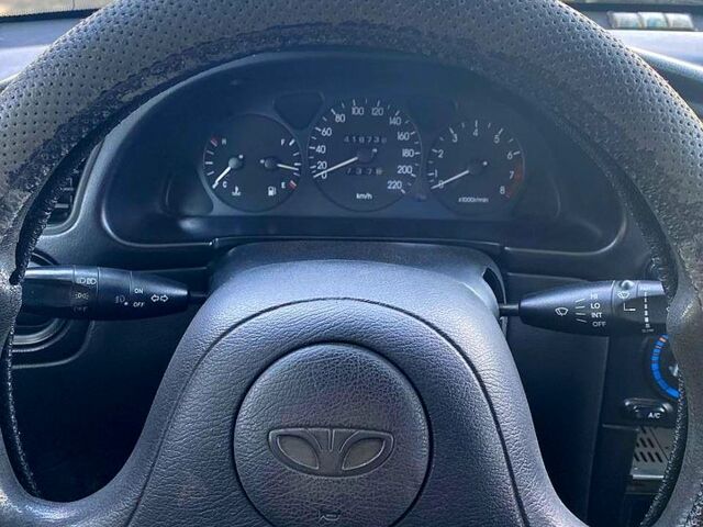 Зеленый Дэу Ланос, объемом двигателя 1.5 л и пробегом 217 тыс. км за 2250 $, фото 4 на Automoto.ua