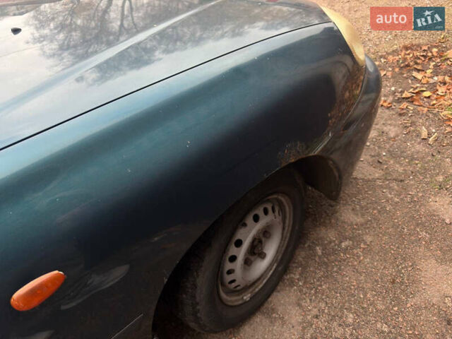 Зеленый Дэу Ланос, объемом двигателя 1.5 л и пробегом 230 тыс. км за 1250 $, фото 5 на Automoto.ua