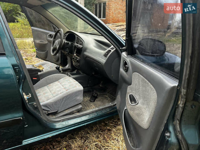 Зеленый Дэу Ланос, объемом двигателя 1.5 л и пробегом 200 тыс. км за 1400 $, фото 28 на Automoto.ua