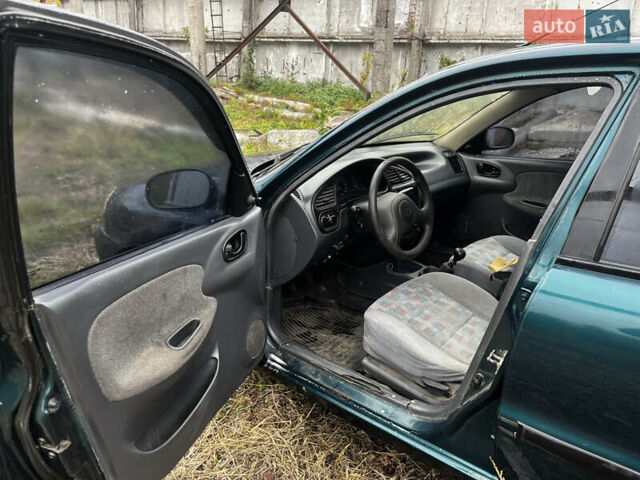 Зеленый Дэу Ланос, объемом двигателя 1.5 л и пробегом 200 тыс. км за 1400 $, фото 26 на Automoto.ua