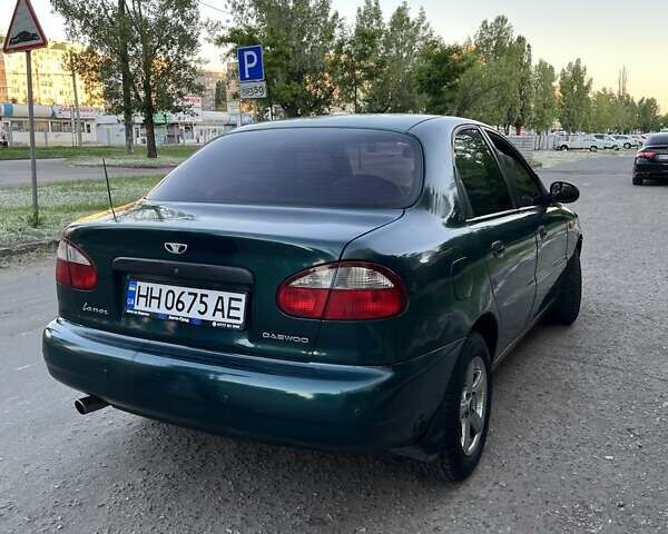 Зеленый Дэу Ланос, объемом двигателя 1.6 л и пробегом 400 тыс. км за 1950 $, фото 4 на Automoto.ua