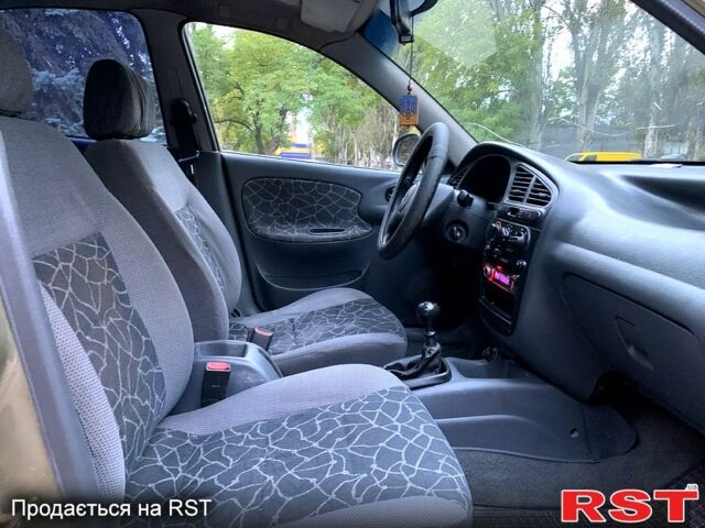 Зеленый Дэу Ланос, объемом двигателя 1.5 л и пробегом 217 тыс. км за 2250 $, фото 5 на Automoto.ua