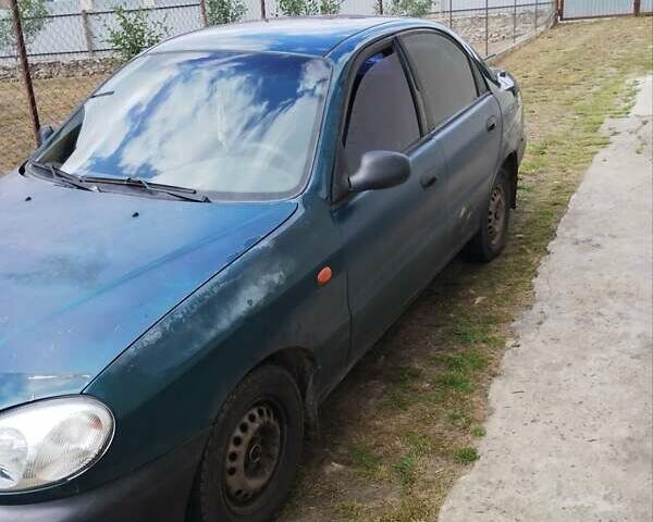 Зеленый Дэу Ланос, объемом двигателя 1.5 л и пробегом 303 тыс. км за 1000 $, фото 1 на Automoto.ua