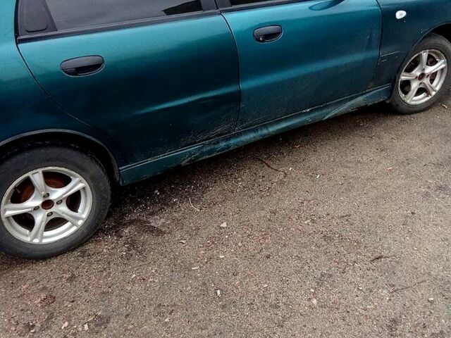 Зелений Деу Ланос, об'ємом двигуна 1.6 л та пробігом 490 тис. км за 1350 $, фото 2 на Automoto.ua