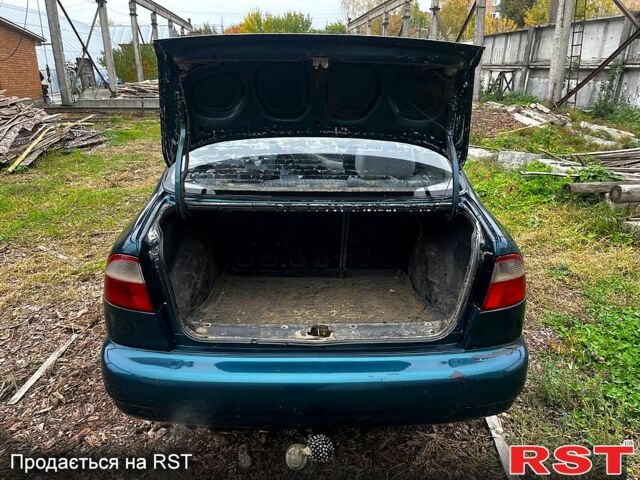 Зеленый Дэу Ланос, объемом двигателя 1.5 л и пробегом 200 тыс. км за 1400 $, фото 11 на Automoto.ua