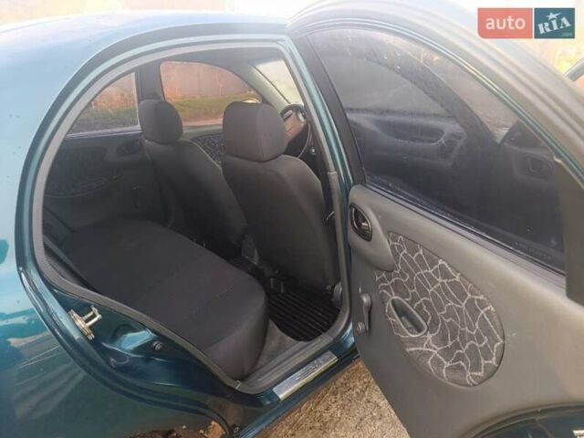 Зелений Деу Ланос, об'ємом двигуна 1.6 л та пробігом 290 тис. км за 1450 $, фото 9 на Automoto.ua