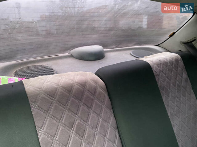 Зеленый Дэу Ланос, объемом двигателя 1.35 л и пробегом 361 тыс. км за 1700 $, фото 11 на Automoto.ua