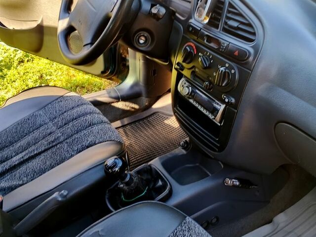 Зеленый Дэу Ланос, объемом двигателя 1.6 л и пробегом 450 тыс. км за 3000 $, фото 8 на Automoto.ua