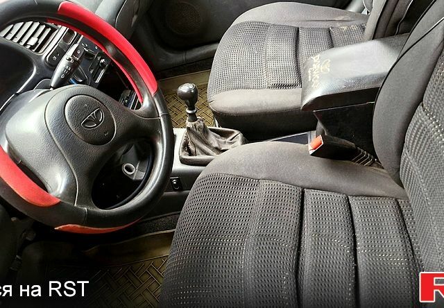 Дэу Ланос 2003 в Славянске на Automoto.ua Зеленый Дэу Ланос, объемом двигателя 1.5 л и пробегом 450 тыс. км за 1100 $, фото 9 на Automoto.ua