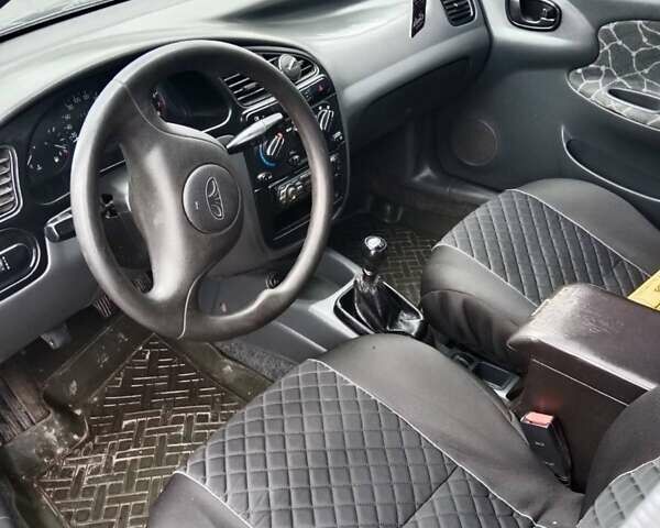 Зеленый Дэу Ланос, объемом двигателя 1.5 л и пробегом 240 тыс. км за 1999 $, фото 8 на Automoto.ua