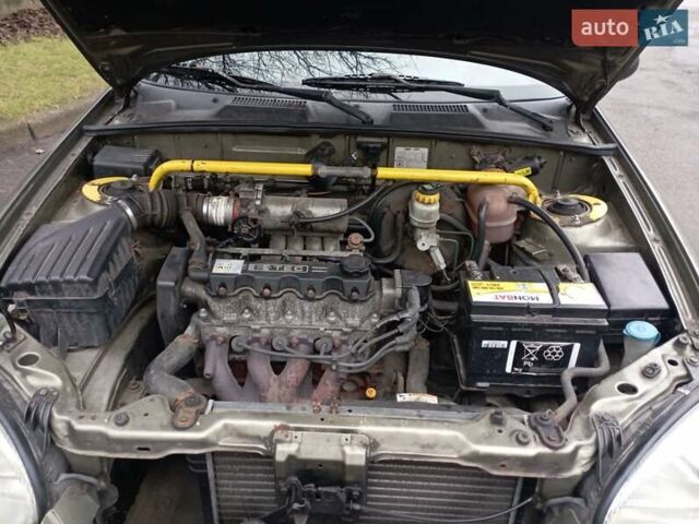 Зеленый Дэу Ланос, объемом двигателя 1.5 л и пробегом 313 тыс. км за 1750 $, фото 6 на Automoto.ua