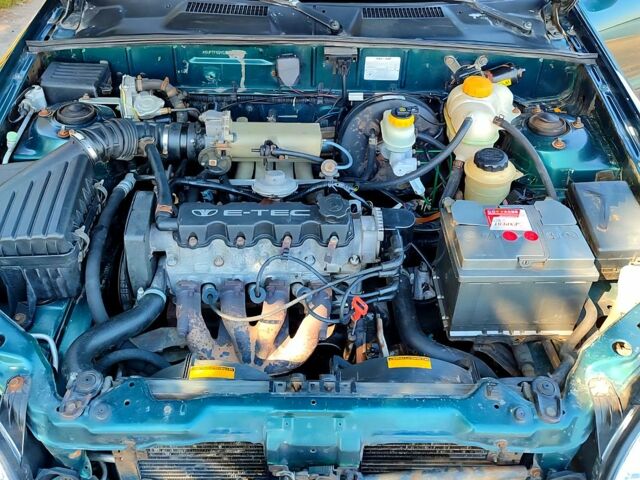 Зеленый Дэу Ланос, объемом двигателя 1.5 л и пробегом 210 тыс. км за 2650 $, фото 5 на Automoto.ua