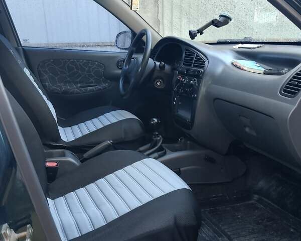 Зеленый Дэу Ланос, объемом двигателя 1.5 л и пробегом 196 тыс. км за 2800 $, фото 6 на Automoto.ua