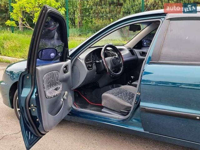 Зеленый Дэу Ланос, объемом двигателя 1.5 л и пробегом 117 тыс. км за 3799 $, фото 26 на Automoto.ua