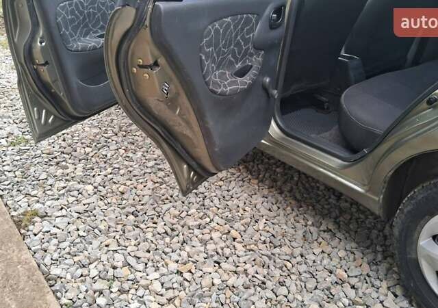 Зеленый Дэу Ланос, объемом двигателя 1.5 л и пробегом 190 тыс. км за 2450 $, фото 5 на Automoto.ua