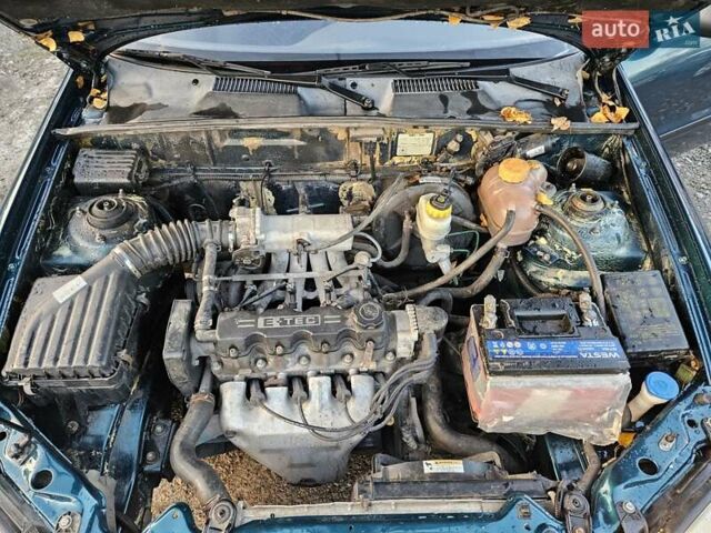 Зеленый Дэу Ланос, объемом двигателя 1.5 л и пробегом 296 тыс. км за 3000 $, фото 14 на Automoto.ua