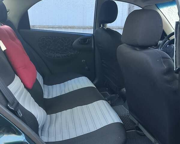 Зеленый Дэу Ланос, объемом двигателя 1.5 л и пробегом 196 тыс. км за 2800 $, фото 7 на Automoto.ua