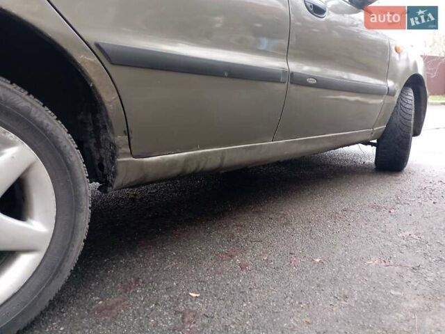 Зеленый Дэу Ланос, объемом двигателя 1.5 л и пробегом 313 тыс. км за 1750 $, фото 7 на Automoto.ua