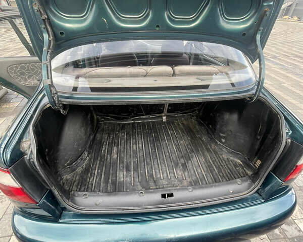 Зеленый Дэу Ланос, объемом двигателя 1.5 л и пробегом 310 тыс. км за 1300 $, фото 8 на Automoto.ua