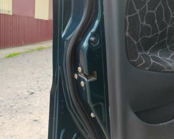 Зелений Деу Ланос, об'ємом двигуна 1.3 л та пробігом 245 тис. км за 1250 $, фото 14 на Automoto.ua