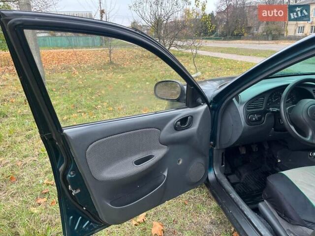Дэу Ланос 2003 в Репке на Automoto.ua Зеленый Дэу Ланос, объемом двигателя 1.5 л и пробегом 250 тыс. км за 1800 $, фото 8 на Automoto.ua