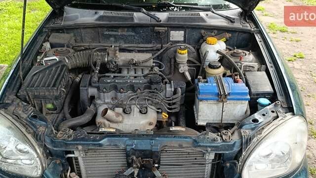 Дэу Ланос 2003 в Вознесенске на Automoto.ua Зеленый Дэу Ланос, объемом двигателя 1.5 л и пробегом 290 тыс. км за 2400 $, фото 3 на Automoto.ua