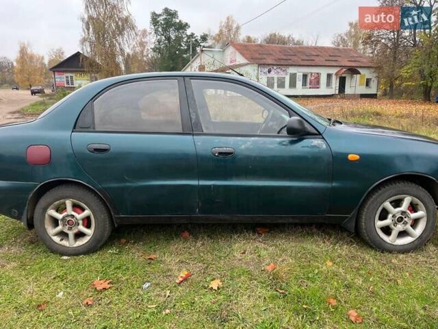 Дэу Ланос 2003 в Репке на Automoto.ua Зеленый Дэу Ланос, объемом двигателя 1.5 л и пробегом 250 тыс. км за 1800 $, фото 6 на Automoto.ua