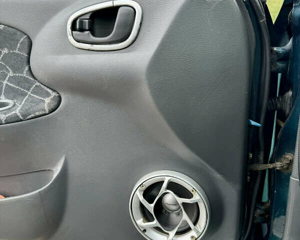 Зеленый Дэу Ланос, объемом двигателя 1.5 л и пробегом 295 тыс. км за 2400 $, фото 7 на Automoto.ua