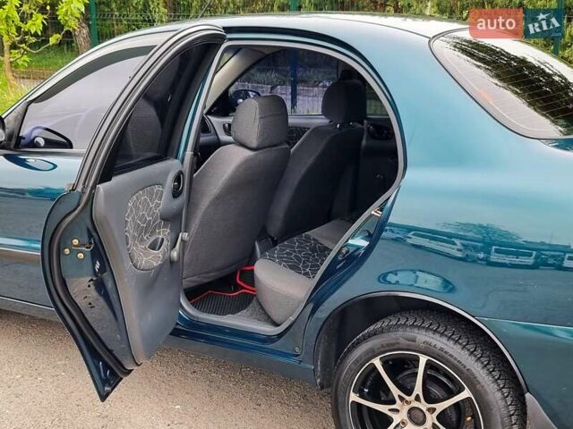 Зеленый Дэу Ланос, объемом двигателя 1.5 л и пробегом 117 тыс. км за 3799 $, фото 30 на Automoto.ua