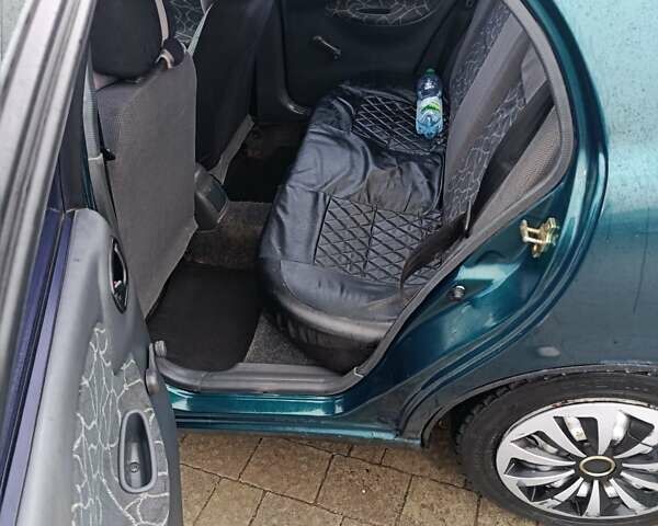 Зеленый Дэу Ланос, объемом двигателя 1.5 л и пробегом 256 тыс. км за 1450 $, фото 5 на Automoto.ua