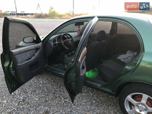 Дэу Ланос 2003 в Виноградове на Automoto.ua Зеленый Дэу Ланос, объемом двигателя 1.6 л и пробегом 255 тыс. км за 3350 $, фото 4 на Automoto.ua